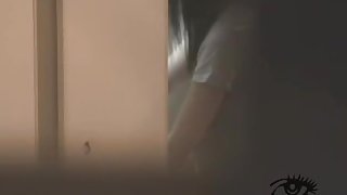 Kinky Japanese babe masturbates solo in voyeur video