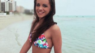 Bikini clad brunette Michelle Bella is fucked in her hotel room