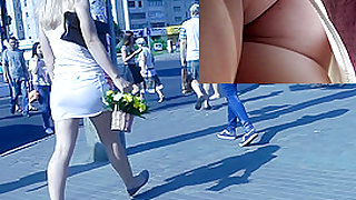 Excellent upskirt pussy isn't covered with any panties