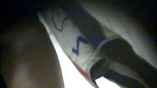 A spy cam in the swimming pool changing room presents a hot sexy woman