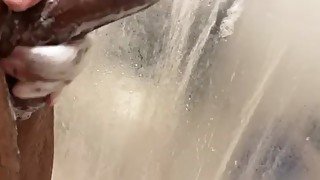 Stroking my huge black cock in the shower
