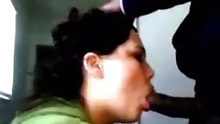 Raven-haired slut smoking cigarette while sucking BBC