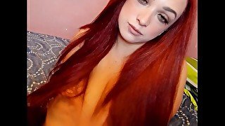 Dirty Talk Red Head Shaking Her Tits.