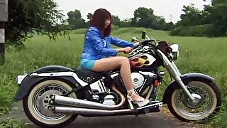 Frisky Japanese milf Tizuru strips naked