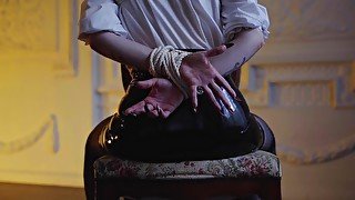 Bondage, gag and latex skirt