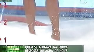 Sexy tv girl shows off an up skirt view of her g string