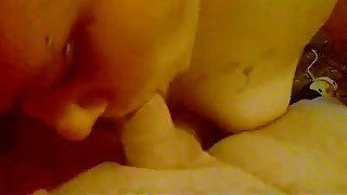 Lewd busty girl seems a bit lazy while wanking and blowing cock