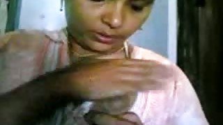 Amateur mature Indian wife shows her tits on home video