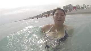 Asian wife in swimsuit big tits