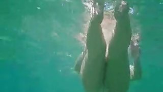 Ful naked nude MILF under the water with hairy pussy