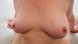 Tit slapping with newspaper