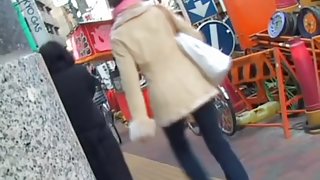 Asian girl got skirt sharked on her bicycle with people near