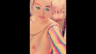 Round ass Curvy Latina feeling sexy in rainbow fishnet top and thong