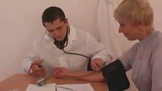 Blonde milf getting horny for a young doctor in the office