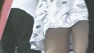 Sexy upskirt with hot blonde babe over a vent