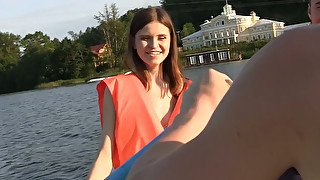 Shameless hussy with tattoo on her ass is having a threesome on a boat