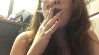 Chubby Goth Brunette Smoking White Filtered Cigarette - Close Up