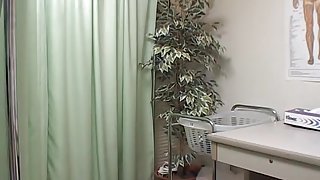 Kinky doctor examines cute Japanese schoolgirl cunt and tits
