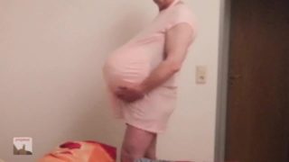 pregman. walk with triplet belly