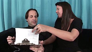 Bosomy brunette Gisselle gives hand job to one horny dude