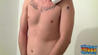 Tattooed straight thug rubs his dick while on the phone solo