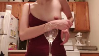 Squirting milk in a glass