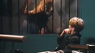 Kinky warden strips scofflaws in a jail at her night shift