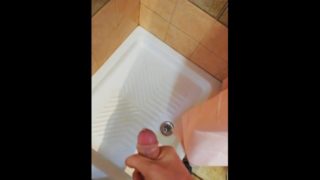 Redheaded cock beating in the shower