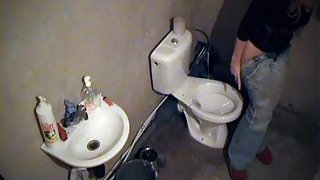 Toilet voyeur pissing