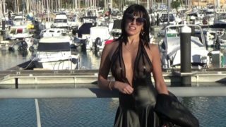 Hot blonde walks without panties and strips naked at the seaport