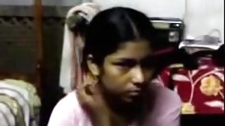 Indian guy makes out with a maid and licks her natural tits