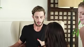 Two hot ladies do pussy riding in front of a dude in a threesome