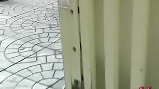 Leggy oriental hottie flashes her underwear when somebody pulls her skirt