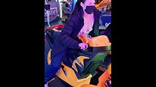 Risk Taking Wife Plays Arcade with Tits Out