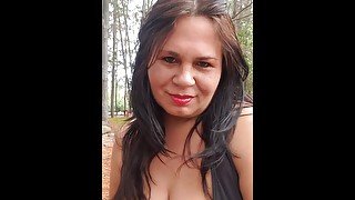mom showing for webcam for stepson in the forest