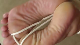 Tied handcuffed blindfolded and cummed soles.