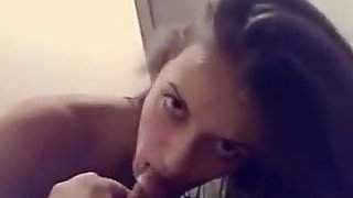 Attractive babe with nice ass sucks the dick on the bed