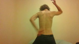 Topless Transgirl Shaking Own Hands Behind Her Back